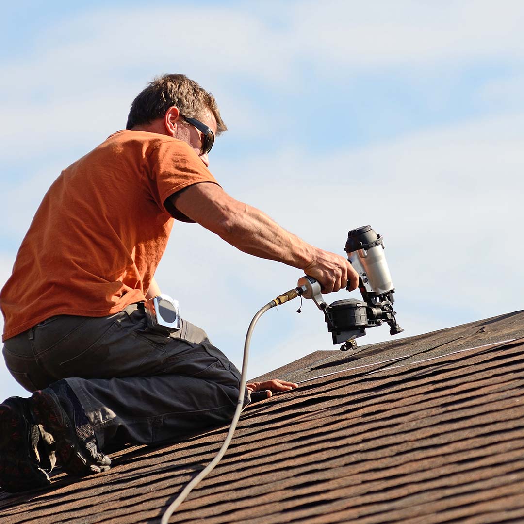 Experienced roofer working