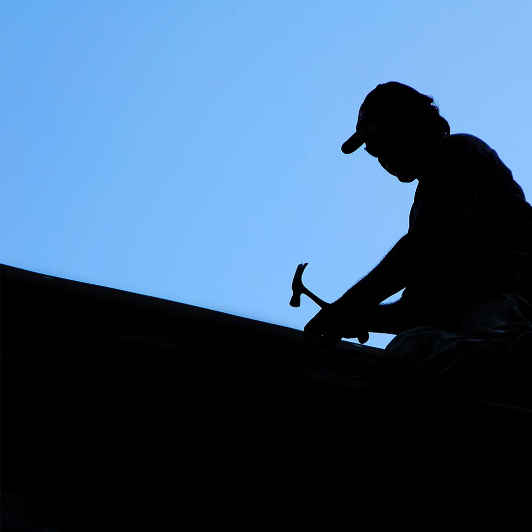 Roof worker's silouette