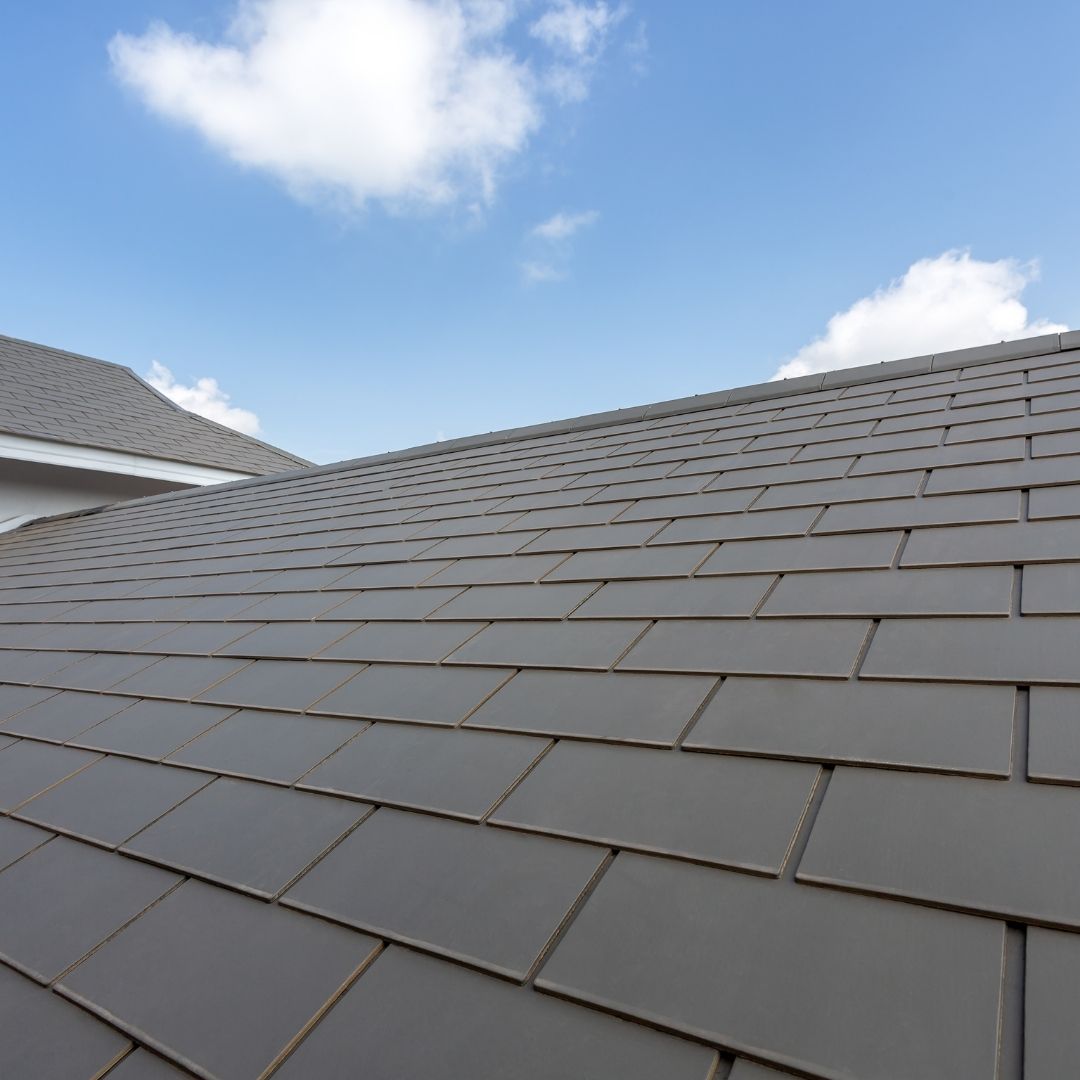 newly replaced roof against blue sky