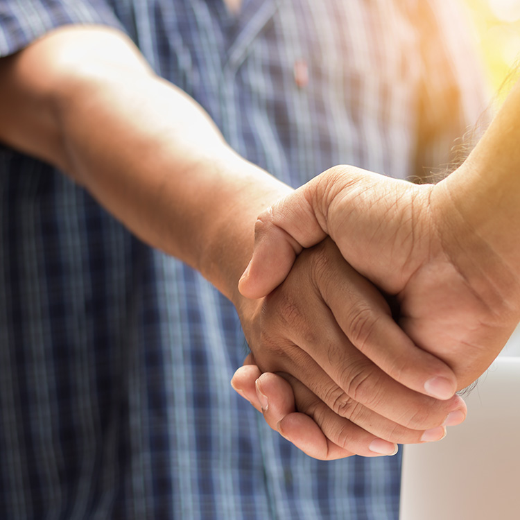 Man shaking hands with contractor